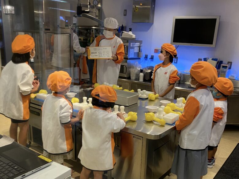 食品開発者のパピリオンへ行き、受付-お仕事体験